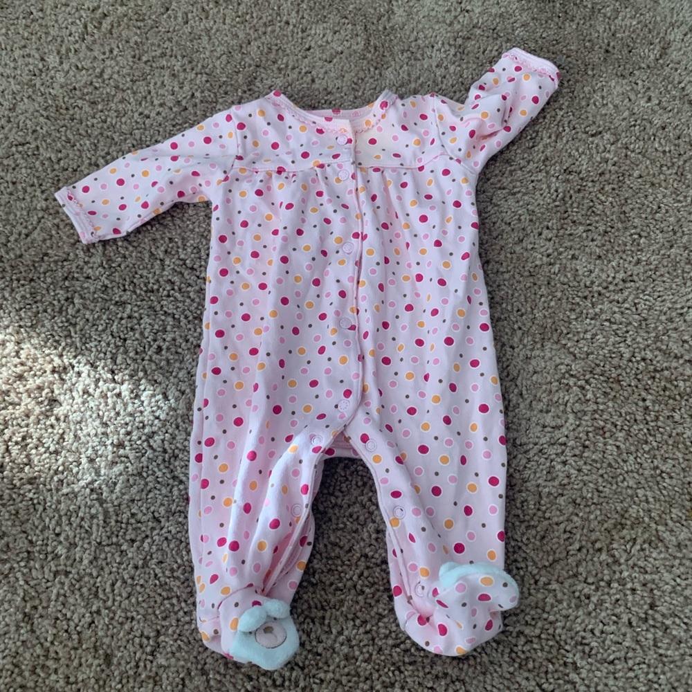 Absorbs pink onesie.